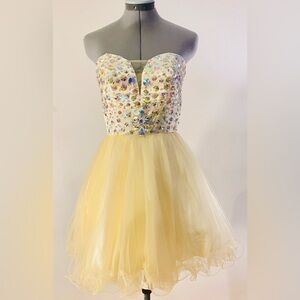 Ring in the New Year with this Hot Little Number by Star Box. Size X-Sm.